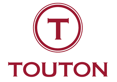 Touton SA — Leader mondial du négoce, du sourcing et de la chaîne d'approvisionnement en matières premières agricoles Logo Touton SA — Négoce international de cacao, café et épices, client Generalia Assurances